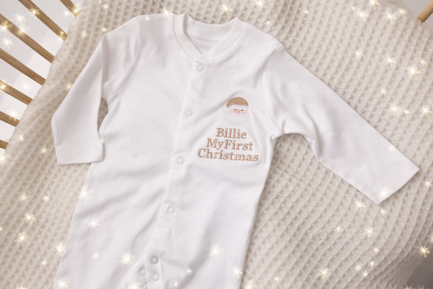 White button babygrow first Christmas Santa face